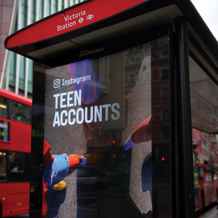 Bus station stop with a digital Instagram ad.
