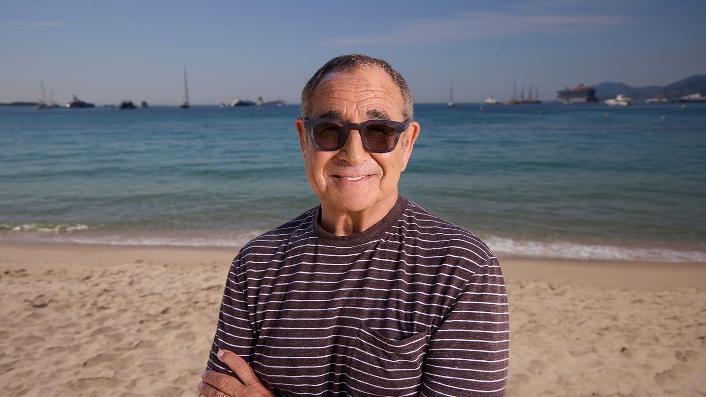 Michael Kassan standing on a beach