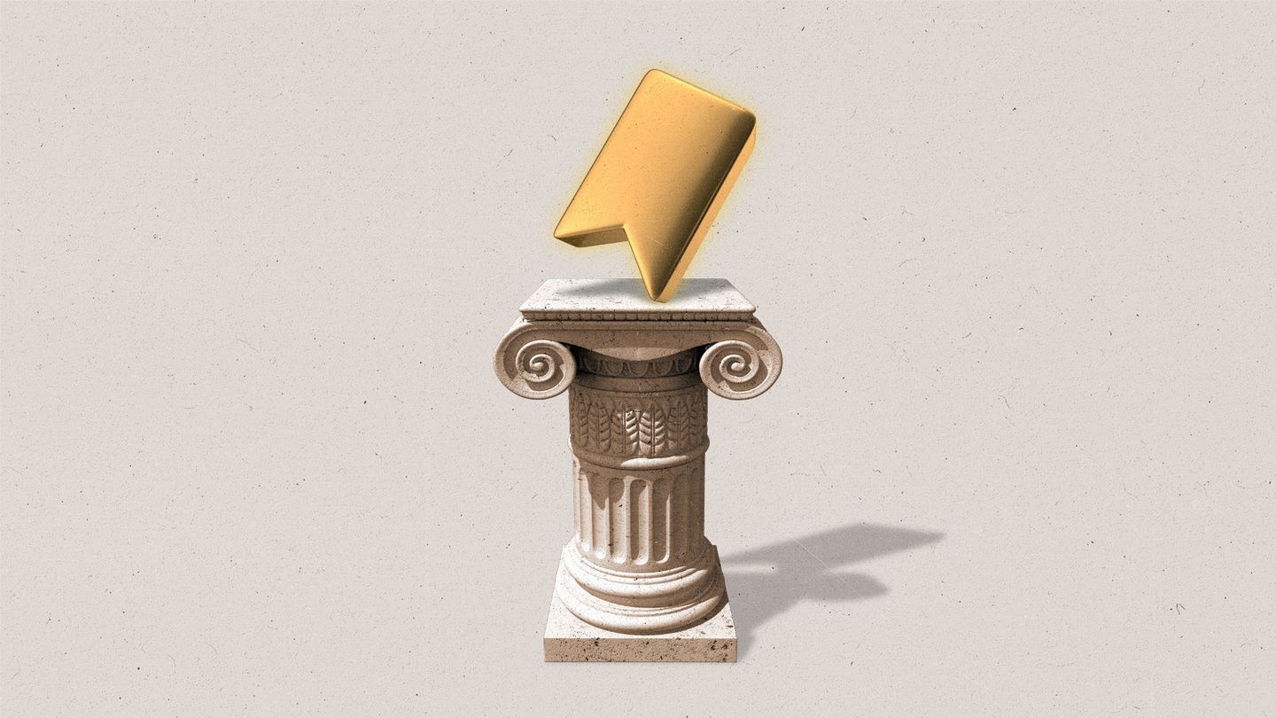 An ornate pillar with a golden bookmark symbol sitting ontop of it.