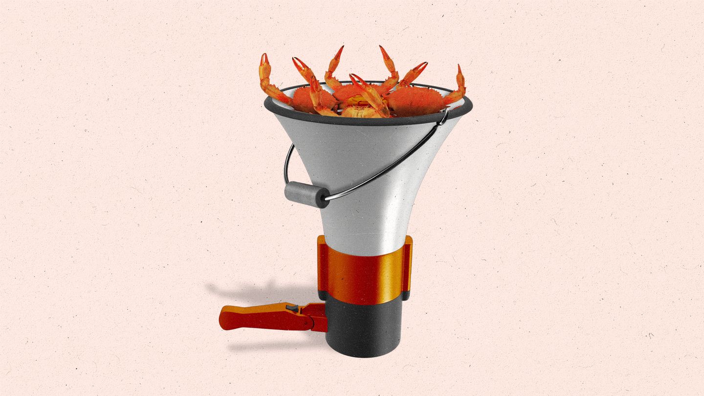 A megaphone made to look like like a bucket with crab claws sticking out of it.