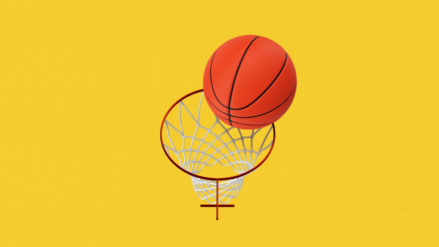 Basketball going into a female symbol-shaped hoop.