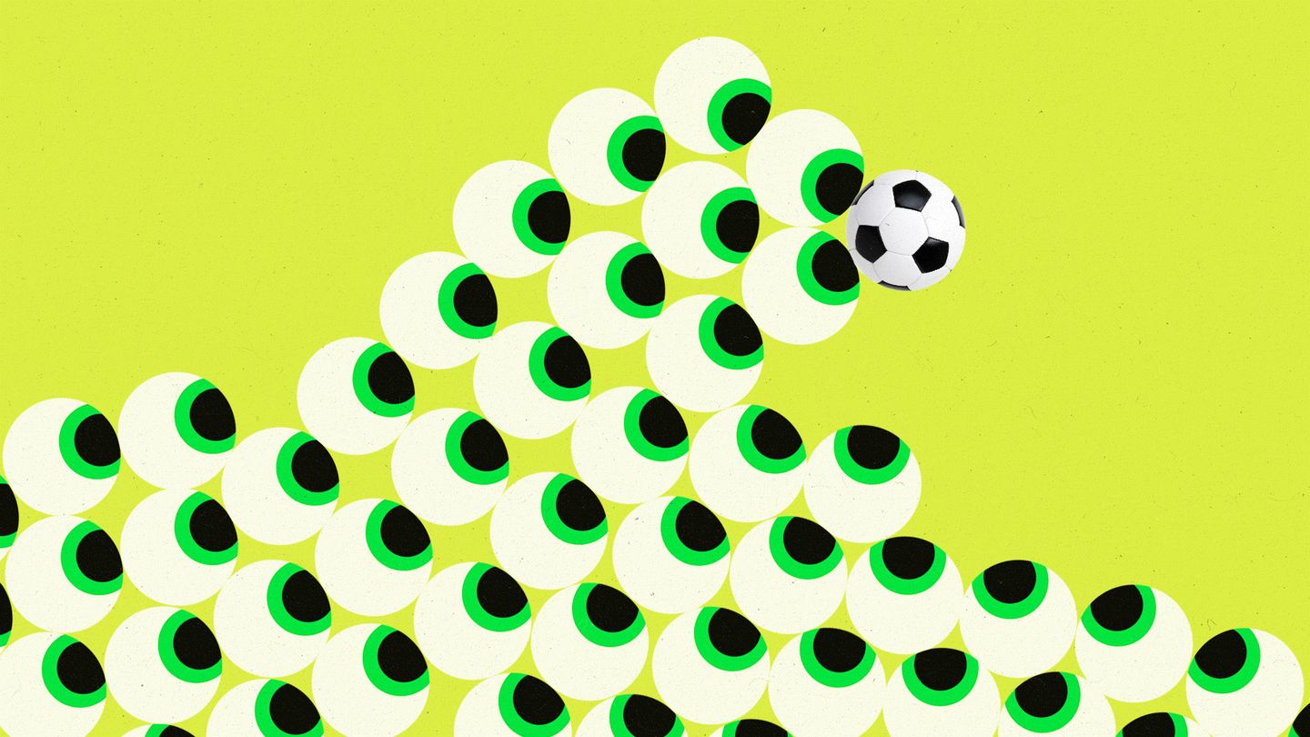 A wave of eyes all looking towards a soccer ball being carried at the crest of the wave.