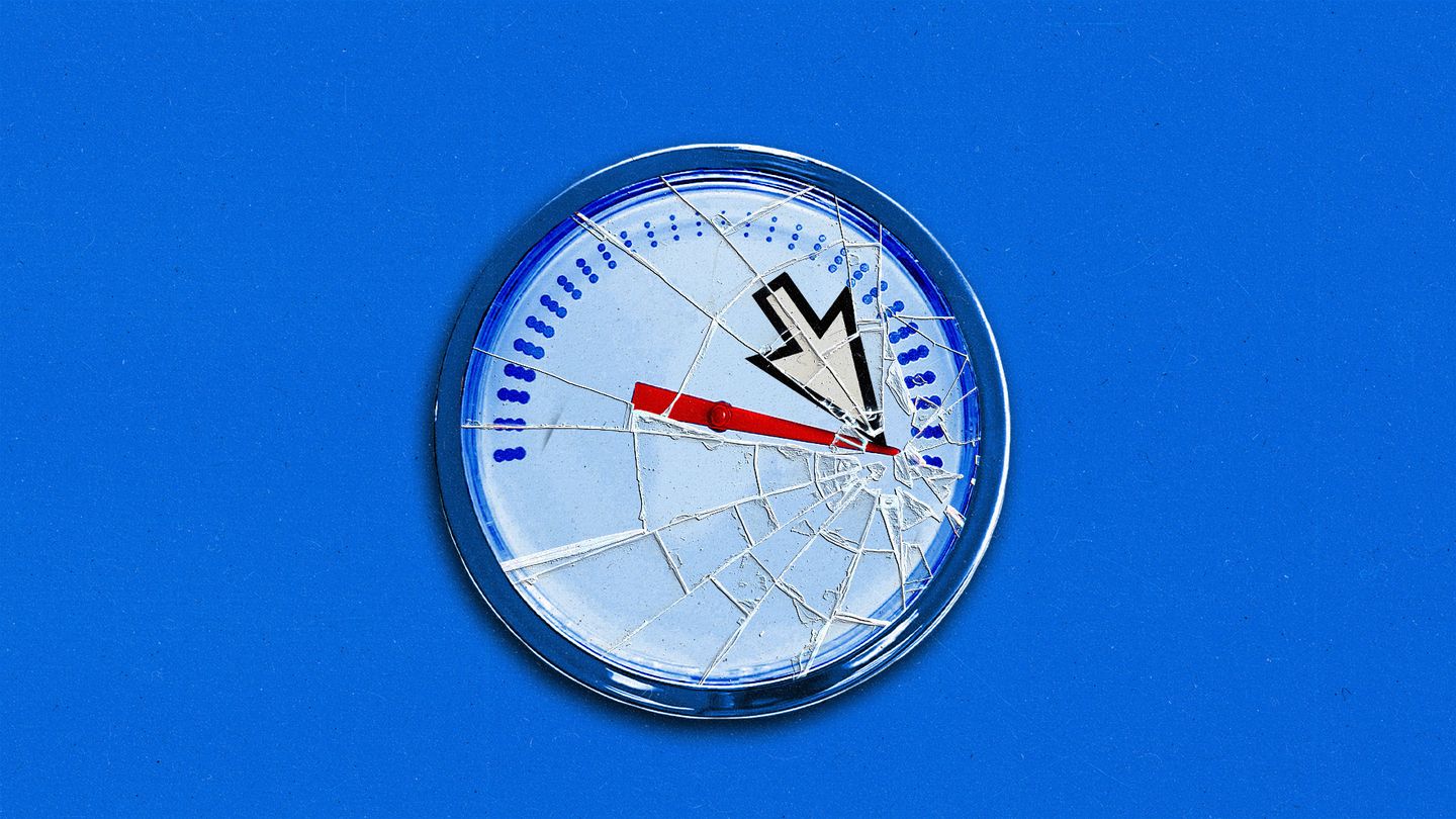 A speedometer maxed out, with a broken glass face.
