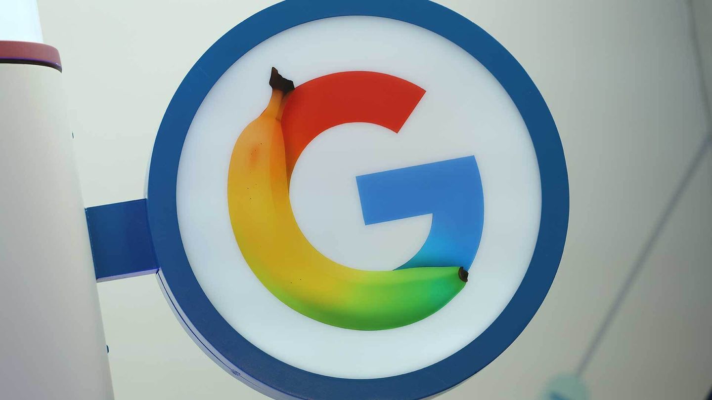 A Google logo with a banana hangs at the launch of the new Google AI Center Berlin