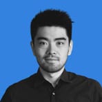 Zac Wang Headshot Blue v1