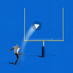 A football kicker kicks a video play button through yellow field goal posts against a blue background.