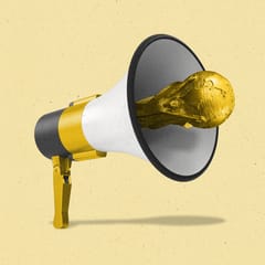 A megaphone with the World Cup trophy sticking out of it.