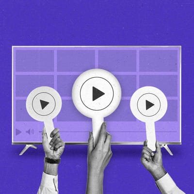 Three hands hold auction paddles with play buttons in front of a Connected TV.
