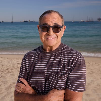 Michael Kassan standing on a beach