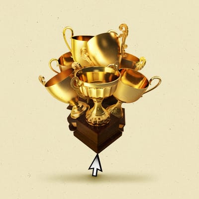 A small cursor holding up a pile of gold trophies.