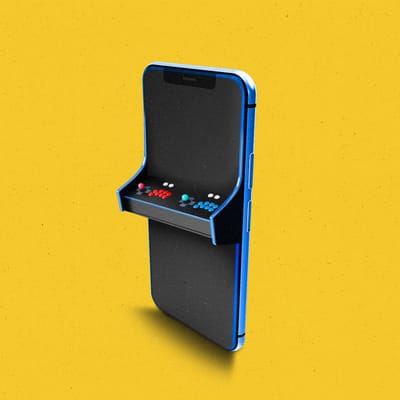 Smartphone with arcade game controls attached to the front of it.