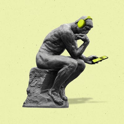 The thinker statue wearing headphones looking down at cellphone with a waveform on it.