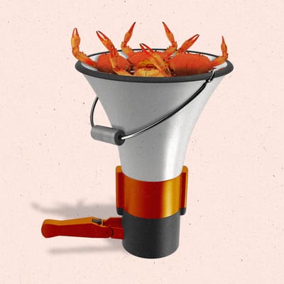 A megaphone made to look like like a bucket with crab claws sticking out of it.