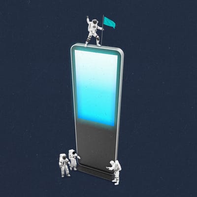 Four astronauts standing around and on top of a digital billboard, with one placing a flag at the top of it.