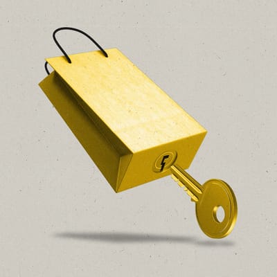A shopping bag made to look like a lock with a keyhole and key underneath.