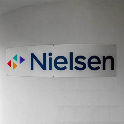 A Nielsen sign sits outside the company's headquarters.