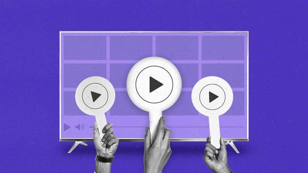 Three hands hold auction paddles with play buttons in front of a Connected TV.