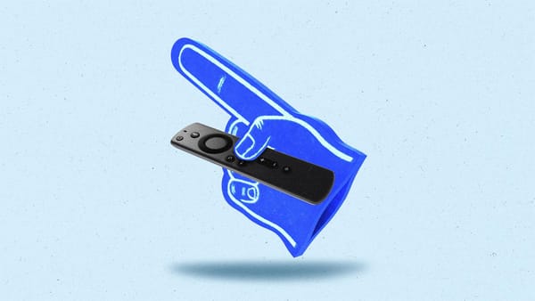 A foam finger holds a Connected TV remote.