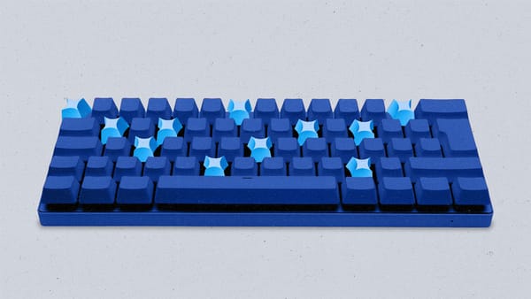 Random keys on a keyboard are replaced with AI sparkle shaped keys.