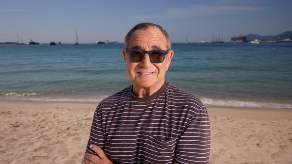 Michael Kassan standing on a beach