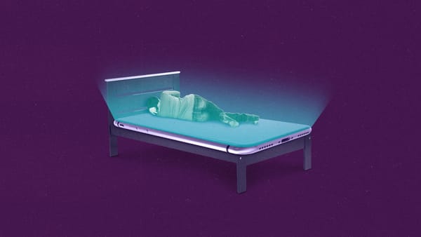 Person lying on large smartphone-mattress