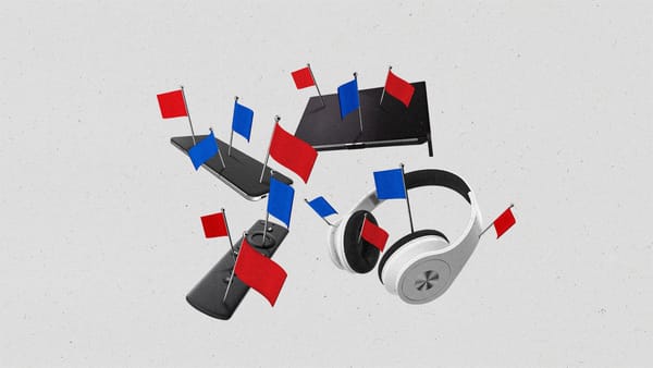 Various devices with red and blue flags staked into them