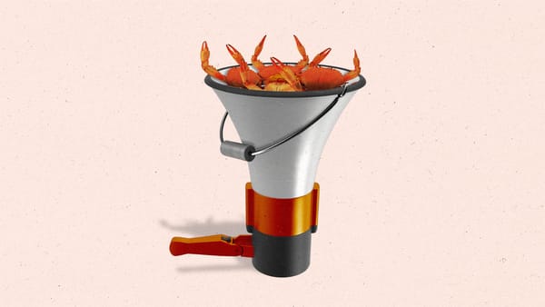 A megaphone made to look like like a bucket with crab claws sticking out of it.