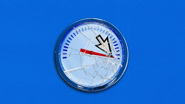 A speedometer maxed out, with a broken glass face.