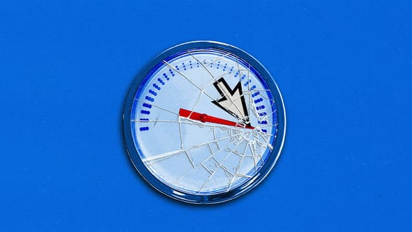 A speedometer maxed out, with a broken glass face.