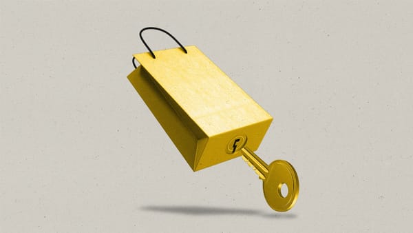 A shopping bag made to look like a lock with a keyhole and key underneath.