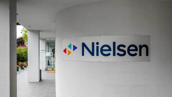 A Nielsen sign sits outside the company's headquarters.