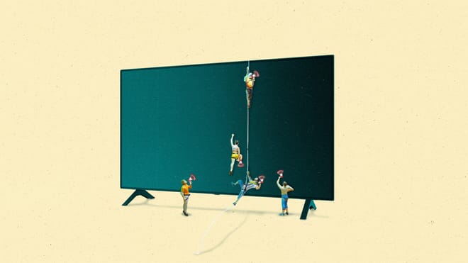 A group of climbers scaling a TV while holding megaphones